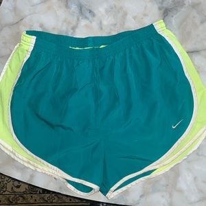 Nike blue and green women’s athletic shorts